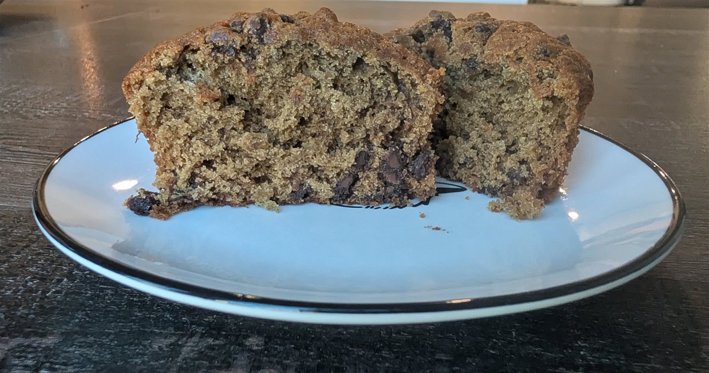 Banana mocha muffin showing its texture and chocolate