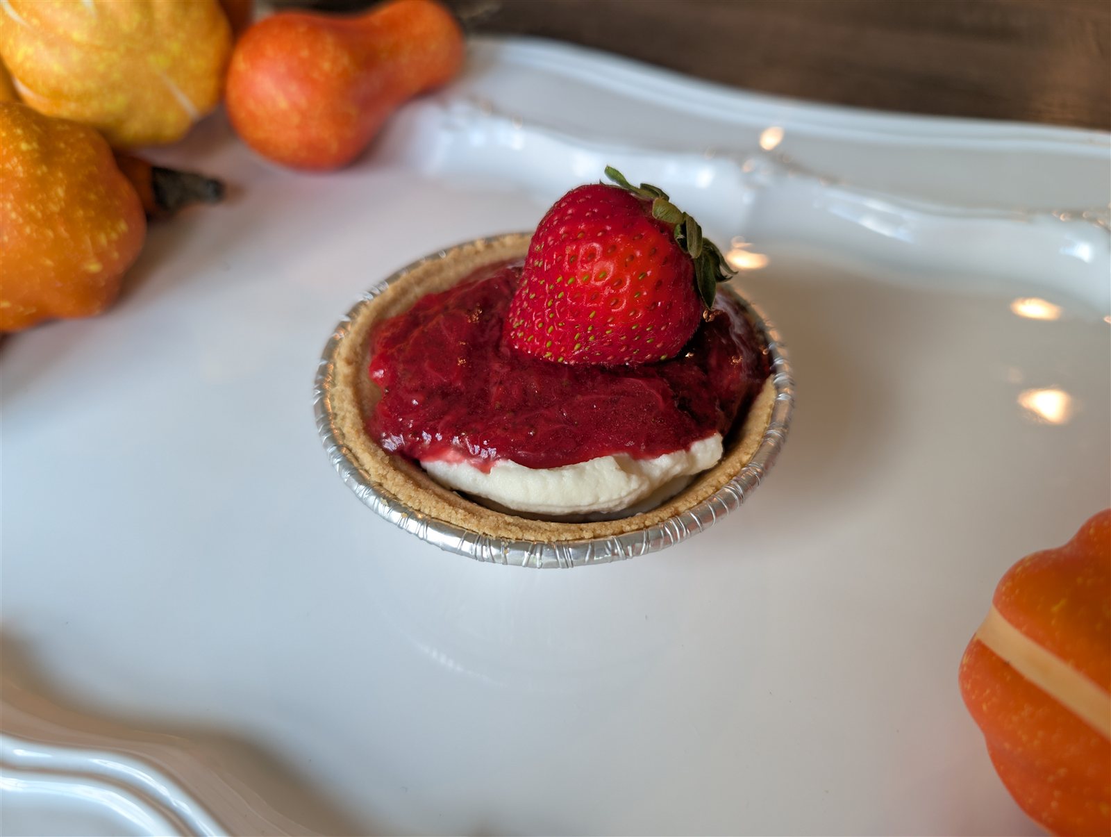 Mini cheesecake topped with fresh strawberry