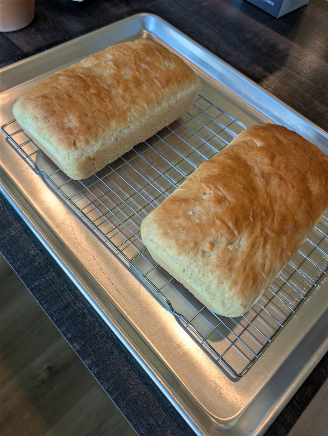 Two loaves of handmade white sandwich bread